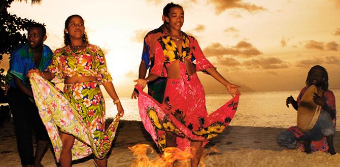 Donne che danzano ballo tipico Moutia sulla spiaggia | Seychelles | Turisanda