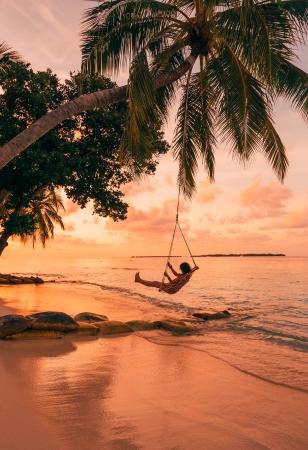 Spiaggia al tramonto | Maldive | Turisanda
